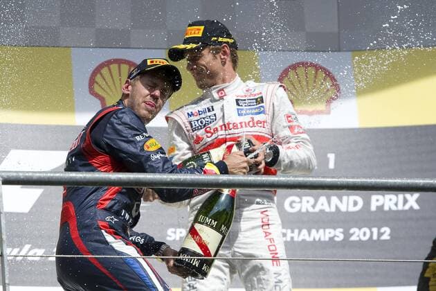 Sebastian VETTEL (li., GER), Red Bull Racing und Jenson BUTTON (GBR), MCLaren Mercedes, bespritzen sich mit Sekt, Rennen am 02.09.2012 Formel 1, Grosser Preis von Belgien in Spa Francorchamps vom 30.08. - 02.09.2012., Saison2012,,