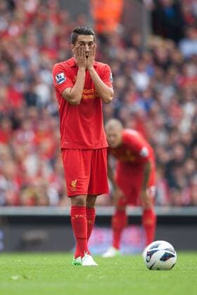 Football - Premier League - Liverpool vs. Arsenal Nuri Sahin of Liverpool looks dejected at Anfield 