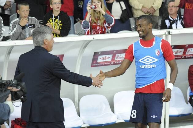 Carlo Ancelotti (Trainer psg) und Salomon Kalou (lille) FOOTBALL : Lille vs PSG - Ligue 1 - 02 09 2012 JBAutissier Panoramic 