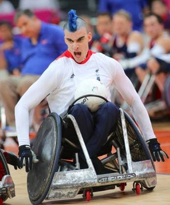 New star of the Paralympics Davis Anthony of Team GB Rugby wheelchair scores during their match against the USA at the London Paralympics 2012, September 5, at the Olympic Park.k. AndrexCamara i-Images 