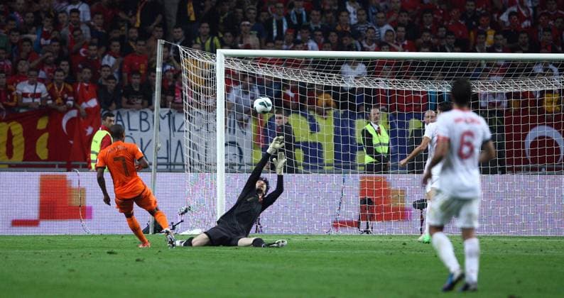 World Cup Qualifier between Holland and Turkey at the Amsterdam Arena on September 07, 2012 in Amsterdam, Holland. Pictured: Luciano Narsingh of Holland and Goalkeeper Tolga Gungor of Turkey. 