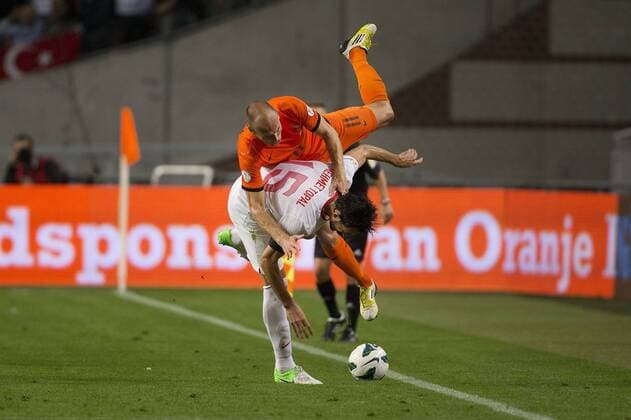 (L-R) Arjen Robben of Holland,Mehmet Topal of Turkey Holland v Turkey World Cup qualifier 2012 2013 xVIxOrangexPicturesx xLaurensxLindhoutxIVx 1136524