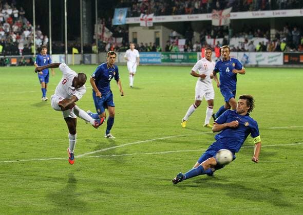 England s Jermaine Defoe scoring his sides third goal..Football - World Cup 2014 Qualifying - Moldova v England - Zimbru Stadium - 7 9 12 ..Mandatory Credit: David Klein Sportimage..EDITORIAL USE ONLY. No use with unauthorized audio, video, data, fixture lists, club league logos or ?live? services. Online in-match use limited to 45 images, no video emulation. No use in betting, games or single club league player publications. Please contact your account representative for further details. EDITORIAL USE ONLY. No use with unauthorised audio, video, data, fixture lists, club league logos or live services. Online in-match use limited to 120 images, no video emulation. No use in betting, games or single club league player publications.