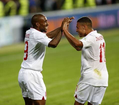 England s Jermaine Defoe celebrates scoring his sides third goal..Football - World Cup 2014 Qualifying - Moldova v England - Zimbru Stadium - 7 9 12 ..Mandatory Credit: David Klein Sportimage..EDITORIAL USE ONLY. No use with unauthorized audio, video, data, fixture lists, club league logos or ?live? services. Online in-match use limited to 45 images, no video emulation. No use in betting, games or single club league player publications. Please contact your account representative for further details. EDITORIAL USE ONLY. No use with unauthorised audio, video, data, fixture lists, club league logos or live services. Online in-match use limited to 120 images, no video emulation. No use in betting, games or single club league player publications.