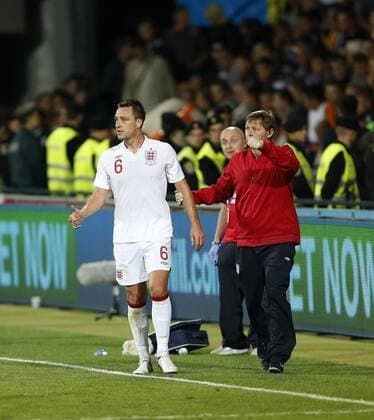 England s John Terry carries on despite getting injured..Football - World Cup 2014 Qualifying - Moldova v England - Zimbru Stadium - 7 9 12 ..Mandatory Credit: David Klein Sportimage..EDITORIAL USE ONLY. No use with unauthorized audio, video, data, fixture lists, club league logos or ?live? services. Online in-match use limited to 45 images, no video emulation. No use in betting, games or single club league player publications. Please contact your account representative for further details. EDITORIAL USE ONLY. No use with unauthorised audio, video, data, fixture lists, club league logos or live services. Online in-match use limited to 120 images, no video emulation. No use in betting, games or single club league player publications.