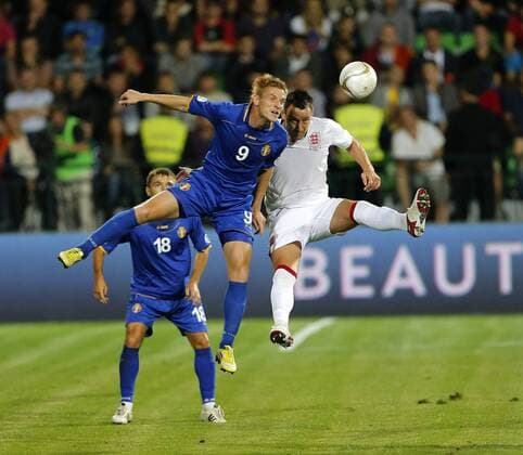 Moldova s Igor Picusciac tussles with England s John Terry..Football - World Cup 2014 Qualifying - Moldova v England - Zimbru Stadium - 7 9 12 ..Mandatory Credit: David Klein Sportimage..EDITORIAL USE ONLY. No use with unauthorized audio, video, data, fixture lists, club league logos or ?live? services. Online in-match use limited to 45 images, no video emulation. No use in betting, games or single club league player publications. Please contact your account representative for further details.... EDITORIAL USE ONLY. No use with unauthorised audio, video, data, fixture lists, club league logos or live services. Online in-match use limited to 120 images, no video emulation. No use in betting, games or single club league player publications.