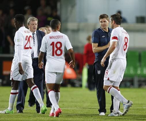 England s Steven Gerrard congratulates Frank Lampard at the final whistle..Football - World Cup 2014 Qualifying - Moldova v England - Zimbru Stadium - 7 9 12 ..Mandatory Credit: David Klein Sportimage..EDITORIAL USE ONLY. No use with unauthorized audio, video, data, fixture lists, club league logos or ?live? services. Online in-match use limited to 45 images, no video emulation. No use in betting, games or single club league player publications. Please contact your account representative for further details.... EDITORIAL USE ONLY. No use with unauthorised audio, video, data, fixture lists, club league logos or live services. Online in-match use limited to 120 images, no video emulation. No use in betting, games or single club league player publications.