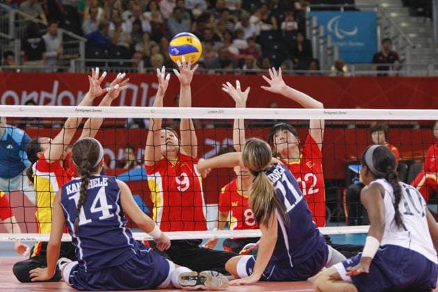 07.09.2012 London 2012 Sitting Volleyball Final Paralympic Games, from the ExCel Arena. Picture shows action from the gold medal contest U.S.A v China. No.11 Allison Miller (USA) smashes to score. xMikexVareyx  ActionPlus11327950