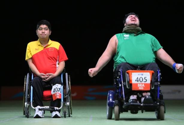 Dirceu Jose Pinto (R) of Brazil celebrates for victory after winning the mixed individual BC4 gold medal match against Zheng Yuansen of China of boccia competition at the London 2012 Paralympic Games in London, Britain, on Sept. 8, 2012. Dirceu Jose Pinto won the gold medal. (Xinhua Hou Jun) (lm) BRITAIN-LONDON-PARALYMPICS-BOCCIA 