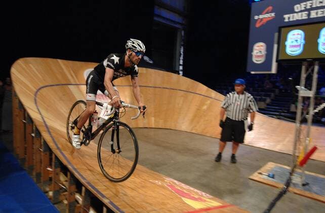 (120909) -- VANCOUVER, Sept. 9, 2012 (Xinhua) -- Maurice Worsfold competes at the Canadian edition of Red Bull Mini Drome on Sept. 8, 2012 in Vancouver, Canada. Red Bull Mini Drome is unique Fixed Gear Event, where cyclists take their street skills to the track in a test of mental stamina, technical precision and raw strength. Red Bull Mini Drome brings skill, speed, balance, and bravado together on a steep and shrunken version, far from the traditional velodrome, to give competitors the most challenging and treacherous ride of their lives. (Xinhua Sergei Bachlakov) CANADA-VANCOUVER-CYCLING 