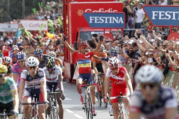 Alberto Contador celebrates with his partners the victory in La Vuelta when comes to the finish line in the stage of La Vuelta 2012 beetwen Cercedilla and Madrid.September 9,2012.  (201209095635)