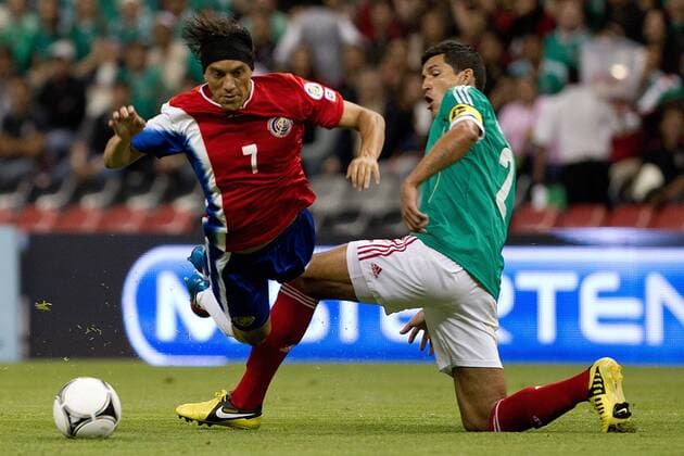 MEXICO CITY, Sept. 11, 2012 - Mexico s Francisco Javier Rodriguez (R) vies with Costa Rica s Christian Bolanos during their 2014 World Cup qualifying soccer match at Azteca stadium, in Mexico City, capital of Mexico, on Sept. 11, 2012. (Xinhua Pedro Mera) (pm) (da) (py) MEXICO-MEXICO CITY-SOCCER-FIFA WORLD CUP QUALIFIER-MEXICO VS COSTA RICA 