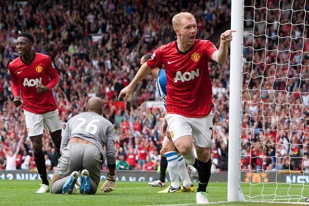 Football - Premier League - Manchester United vs. Wigan Athletic Paul Scholes of Manchester United celebrates his opening goal at Old Trafford 