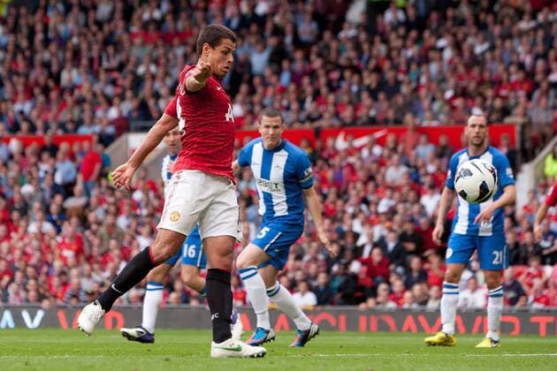 Football - Premier League - Manchester United vs. Wigan Athletic Javier - Chicharito - Hernandez of Manchester United scores his sides second goal at Old Trafford 