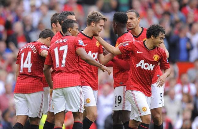 Nick Powell of Manchester United (c) is congratulated after scoring.Football - Manchester Utd v Wigan Athletic - Barclays Premier League - Old Trafford Stadium - Season 12 13 - 15 9 12. EDITORIAL USE ONLY. No use with unauthorised audio, video, data, fixture lists, club league logos or live services. Online in-match use limited to 120 images, no video emulation. No use in betting, games or single club league player publications.