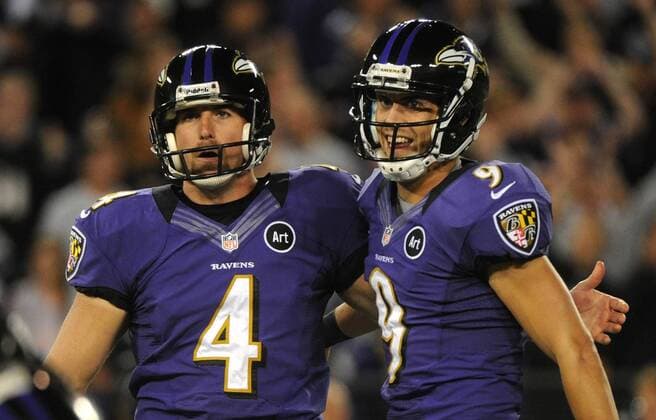 Baltimore Ravens kicker kicker Justin Tucker (9) and holder Sam Koch embrace after kicking a game winning 27-yard field goal against the New England Patriots at M&T Bank Stadium in Baltimore, Maryland on September 23, 2012. The Ravens defeated the Patriots 31-30.  WAP20120923309