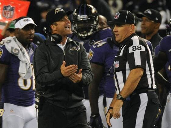 Baltimore Ravens head coach John Harbaugh argues with replacement linesman Rodney Russell during the third quarter against the New England Patriots at M&T Bank Stadium in Baltimore, Maryland on September 23, 2012. The Ravens defeated the Patriots 31-30.  WAP20120923316