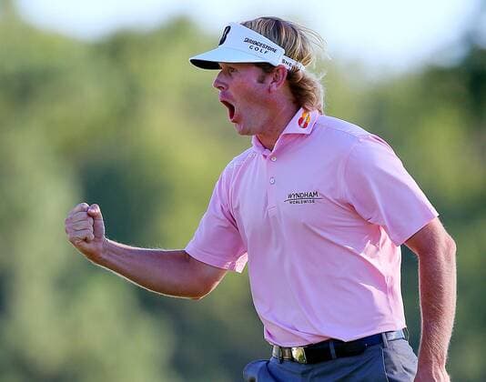 Sept. 23, 2012 - Atlanta, GA, USA - Brandt Snedeker reacts to chipping it in the hole for a birdie to go 11-under par on the 17th green to win the Tour Championship and FedExCup at East Lake Golf Club in Atlanta, Georgia on Sunday, September 23, 2012. Snedeker finished his round at 10-under par for a three-stroke victory over Justin Rose to take home both trophies. Tour Championship - ZUMAm67
