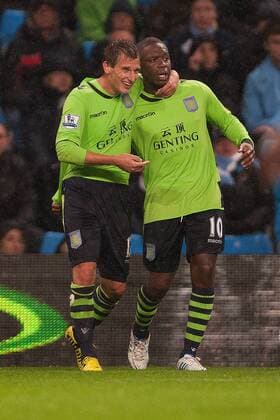 Capital One Cup - Manchester City vs. Aston Villa -- Marc Albrighton of Aston Villa celebrates with goal scorer Charles N Zogbia following his extra time goal at the Etihad Stadium 