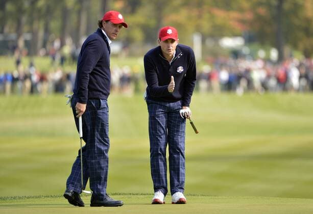 Team USA s Phil Mickelson (L) and Team USA s Keegan Bradley line up their birdie putt on the 15th hole at the 39th Ryder Cup at Medinah Country Club on September 28, 2012 in Medinah, Illinois.  BKX2012092838