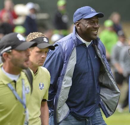 Michael Jordan (R) walks up the 18th fairway with Team Europe s Luke Donald of England at the 39th Ryder Cup at Medinah Country Club on September 28, 2012 in Medinah, Illinois.  BKX2012092847