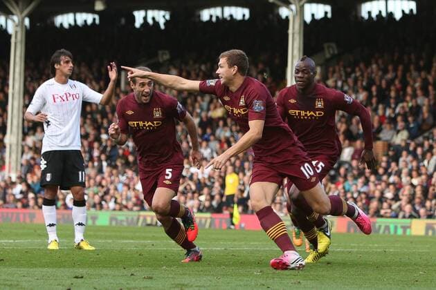 Football - Premier League - Fulham FC vs Manchester City Manchester City s Edin Dzeko scores at Craven Cottage, London, England 