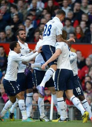 Jan Vertonghen of Tottenham is mobbed as he celebrates scoring the first goal -Barclays Premier League - Manchester United (ManU) vs Tottenham Hotspur - Old Trafford Stadium - Manchester - 29 09 12 - EDITORIAL USE ONLY. No use with unauthorised audio, video, data, fixture lists, club league logos or live services. Online in-match use limited to 120 images, no video emulation. No use in betting, games or single club league player publications.