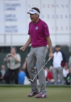 Team Europe s Ian Poulter of England reacts after sinking a birdie putt on the 18th hole to defeat Team USA s Jason Dufner and Zach Johnson at the 39th Ryder Cup at Medinah Country Club on September 29, 2012 in Medinah, Illinois. After the second day of play the United States leads Europe 10-6 and needs 4 1 2 points in the final round to win the Ryder Cup.  BKX2012092970