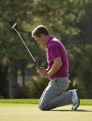 Team Europe s Luke Donald of England reacts after missing his birdie putt on the 10th hole at the 39th Ryder Cup at Medinah Country Club on September 29, 2012 in Medinah, Illinois.  BKX2012092910