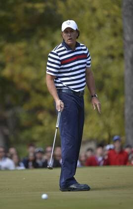 Team USA s Phil Mickelson reacts after missing a birdie putt on the fourth hole during the singles matches at the 39th Ryder Cup at Medinah Country CLub on September 30, 2012 in Medinah, Illinois.  CHI2012093010
