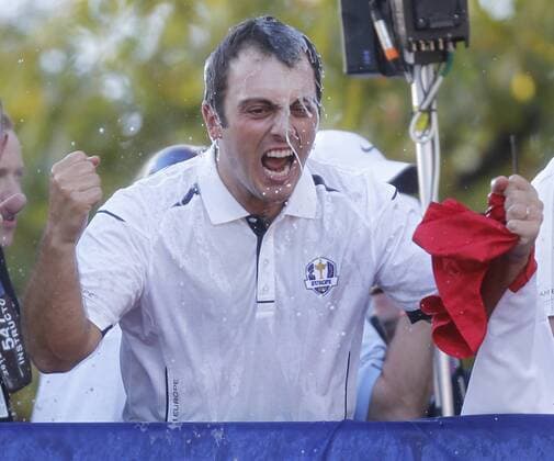 Team Europe s Francesco Molinari, of Italy, celebrates with after Europe defeated the USA 14 1 2 to 13 1 2 to win the 39th Ryder Cup at Medinah Country Club on September 30, 2012 in Medinah, Illinois.  MED2012093009