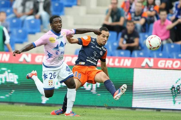 Mongongu (Evian) et Karim Ait Fana (Montpellier) FOOTBALL : Montpellier vs Evian Thonon Gaillard - Ligue 1 - 06 10 2012 RichardGosselin Panoramic 