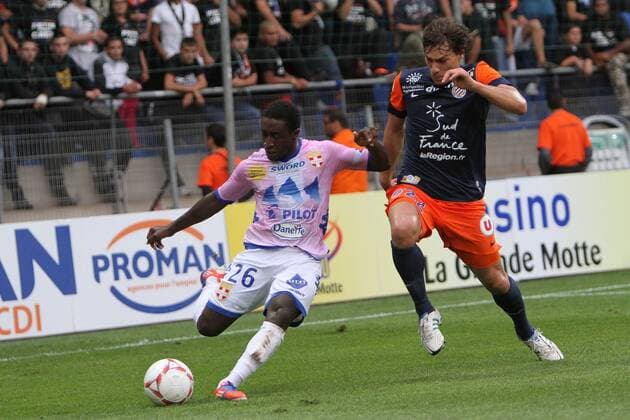 DjaDjedje Dja Djedje (Evian) et Benjamin Stambouli (Montpellier) FOOTBALL : Montpellier vs Evian Thonon Gaillard - Ligue 1 - 06 10 2012 RichardGosselin Panoramic 