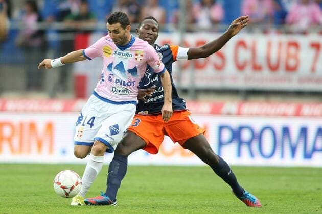 Cedric Barbosa (Evian) et Mapou Yanga Mbiwa (Montpellier) FOOTBALL : Montpellier vs Evian Thonon Gaillard - Ligue 1 - 06 10 2012 RichardGosselin Panoramic 