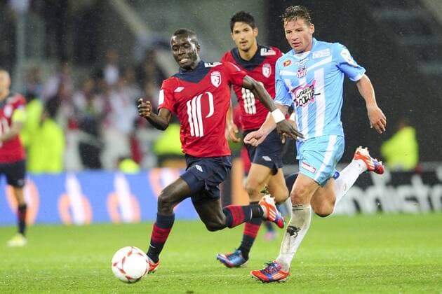 Idrissa Gana Gueye (Lille) vs Mehdi Mostefa (ajaccio) FOOTBALL : Lille Losc vs Ajaccio - L1 - 06 10 2012 JBAutissier Panoramic 