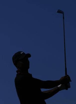 (121009) -- ANTALYA, Oct. 9, 2012 (Xinhua) -- Tiger Woods of the United States hits his tee shot on the ninth hole during his match at the Turkish Airlines World Golf Final at Antalya Golf Club in Antalya, Turkey, October 9, 2012. (Xinhua Ma Yan) TURKEY-ANTALYA-WORLD GOLF FINAL 