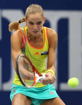 Generali Ladies Linz 2012,WTA Tour, Damen Hallen Tennis Turnier in Linz, Oesterreich, Arantxa Rus (NED), Aktion,Einzelbild,Halbkoerper,Hochformat,