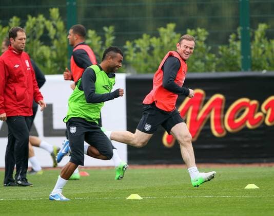 England s Wayne Rooney and Ashley Cole during training..England Training - London Colney- 11 10 12 - Picture David Klein Sportimage EDITORIAL USE ONLY. No use with unauthorised audio, video, data, fixture lists, club league logos or live services. Online in-match use limited to 120 images, no video emulation. No use in betting, games or single club league player publications.