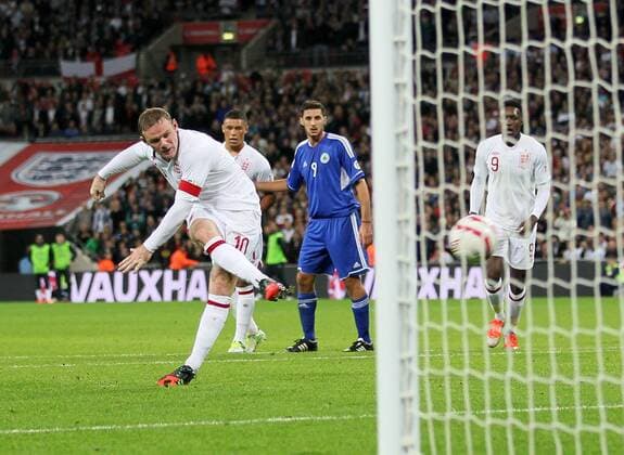 England s Wayne Rooney scoring his sides opening goal..England v San Marino - FIFA World Cup Qualifier - Wembley Stadium- 12 10 12 - Picture David Klein Sportimage EDITORIAL USE ONLY. No use with unauthorised audio, video, data, fixture lists, club league logos or live services. Online in-match use limited to 120 images, no video emulation. No use in betting, games or single club league player publications.