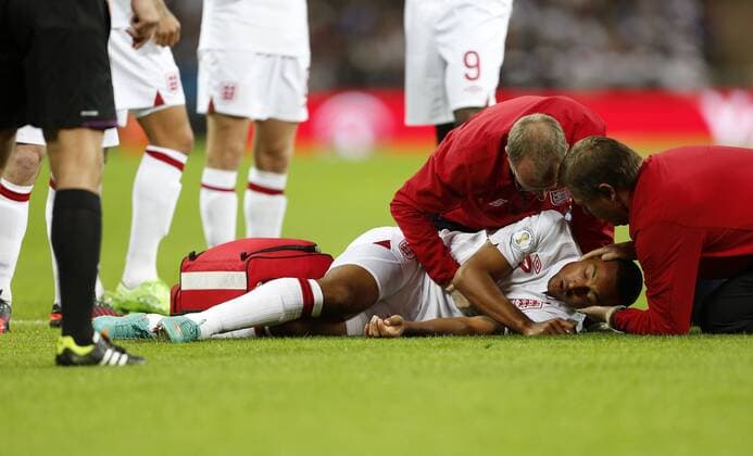 England s Theo Walcott gets injured and taken off..England v San Marino - FIFA World Cup Qualifier - Wembley Stadium- - Picture DavidxKlein Sportimage EDITORIAL USE ONLY. No use with unauthorised audio, video, data, fixture lists, club league logos or live services. Online in-match use limited to 120 images, no video emulation. No use in betting, games or single club league player publications.