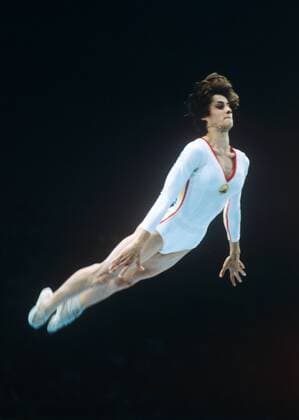 USSR. Moscow. 22nd Olympics. Gymnastics. Romanian gymnast Nadia Comaneci performs the vault.  TASS_1255465