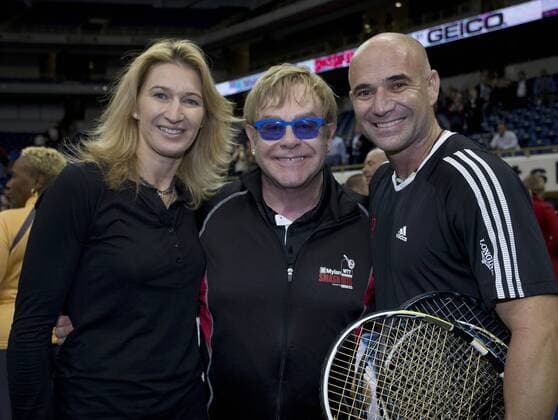 Oct. 16, 2012 - Pittsburgh, Pennsylvania, U.S. - STEFFI GRAF, Sir ELTON JOHN and ANDRE AGASSI at the 2012 Mylan WTT Smash Hits. The Mylan World Team Tennis Smash Hits Charity Night paired legends of the game with current stars for a star-studded fundraiser for AIDS. Tennis 2012 - Mylan Smash Hits Charity 2012 - ZUMAmu3