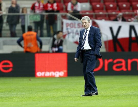 England s Roy Hodgson tests the pitch before kick-off..Poland v England - FIFA World Cup Qualifier - National Stadium, Warsaw Stadium- 17 10 12 - Picture David Klein Sportimage EDITORIAL USE ONLY. No use with unauthorised audio, video, data, fixture lists, club league logos or live services. Online in-match use limited to 120 images, no video emulation. No use in betting, games or single club league player publications.