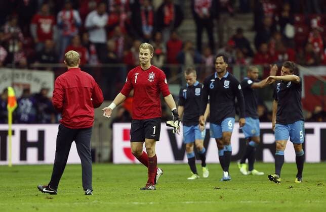 England s Joe Hart looks on dejected at the final whistle..Poland v England - FIFA World Cup Qualifier - National Stadium, Warsaw Stadium- 17 10 12 - Picture David Klein Sportimage EDITORIAL USE ONLY. No use with unauthorised audio, video, data, fixture lists, club league logos or live services. Online in-match use limited to 120 images, no video emulation. No use in betting, games or single club league player publications.