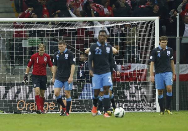 England s Joe Hart looks on dejected after Poland s equaliser..Poland v England - FIFA World Cup Qualifier - National Stadium, Warsaw Stadium- 17 10 12 - Picture David Klein Sportimage EDITORIAL USE ONLY. No use with unauthorised audio, video, data, fixture lists, club league logos or live services. Online in-match use limited to 120 images, no video emulation. No use in betting, games or single club league player publications.