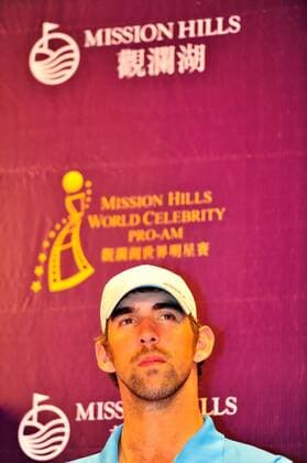 US Olympic swimming champion Michael Phelps attends a press conference for the 2012 Mission Hills World Celebrity Pro-Am golf tournament in Haikou city, south Chinas Hainan province, 18 October 2012. Ronaldo, Michael Phelps highlight press conference for World Celebrity Pro-Am golf tournament in Haikou  20121018_35509
