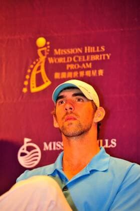 US Olympic swimming champion Michael Phelps attends a press conference for the 2012 Mission Hills World Celebrity Pro-Am golf tournament in Haikou city, south Chinas Hainan province, 18 October 2012. Ronaldo, Michael Phelps highlight press conference for World Celebrity Pro-Am golf tournament in Haikou  20121018_35520
