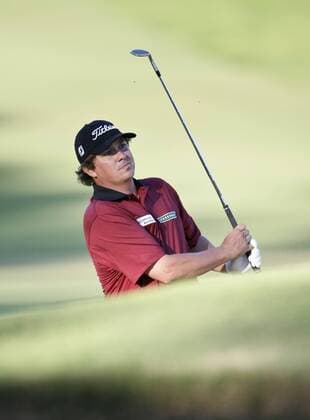 20.10.2012 Perth, Australia. Jason Dufner (USA) hits out of the bunker on the 18th hole to finish the day in equal second one shot from the lead during the third Round of the ISPS Handa Perth International Golf Tournament from the Lake Karrinyup Country Club. xDavidxWoodleyx  ActionPlus20198374