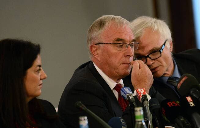 (121022) -- GENEVA, Oct. 22, 2012 (Xinhua) -- International Cycling Union (UCI) president Pat McQuaid (C) attends a news conference on the Lance Armstrong doping scandal in Geneva, Switzerland, on Oct. 22, 2012. Cycling s world governing body UCI on Monday ratified the U.S. Anti-Doping Agency (USADA) decision to strip cyclist Lance Armstrong of his seven Tour de France titles and ban him for life. (Xinhua Wang Siwei) SWITZERLAND-GENEVA-ARMSTRONG-UCI-DECISION 