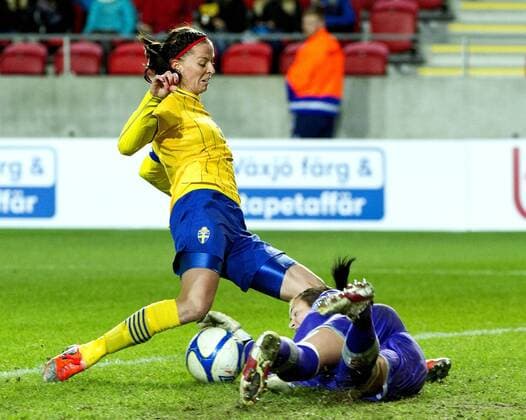 Växjö Sweden 2012 10 23 Exhibitions game Ladies 2012 Sweden vs Schweiz Lotta Schelin(SWE) and Jennifer Oehrli (SCH) 